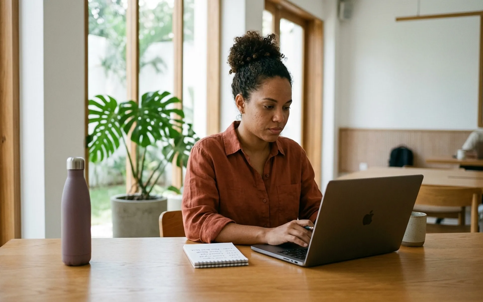 Executive assistant managing a calendar and inbox from a home office